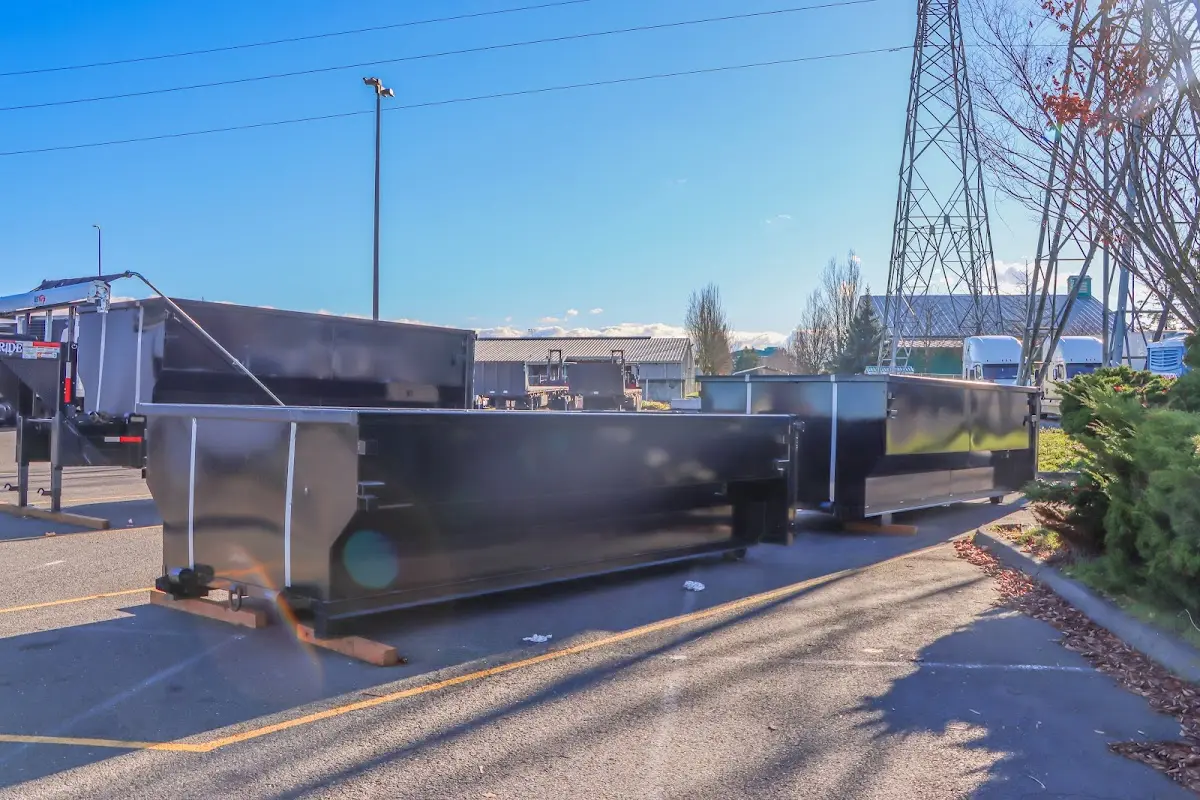 Roll-off dumpster ready for waste disposal at job site for Construction Dumpster Rental in Gilmer